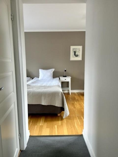 Postel nebo postele na pokoji v ubytování Mullsjö Hotell & Konferens