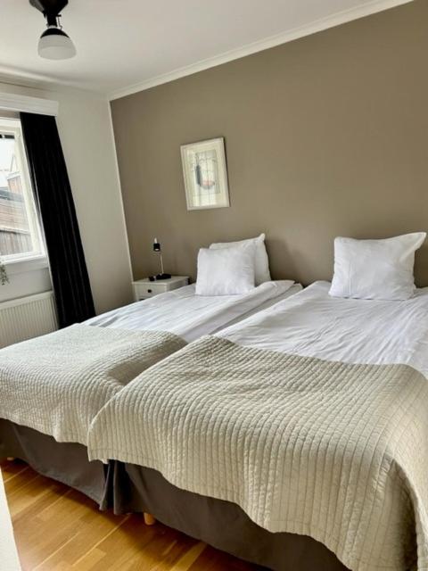 Postel nebo postele na pokoji v ubytování Mullsjö Hotell & Konferens