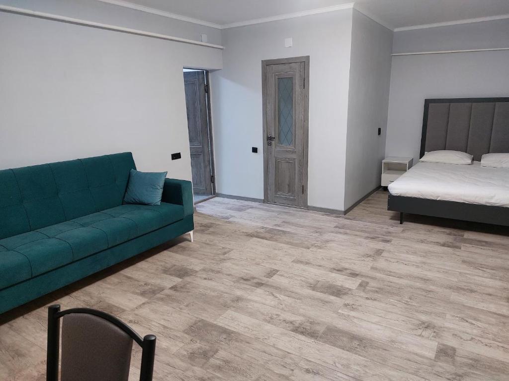 Postel nebo postele na pokoji v ubytování Bagysh Hotel