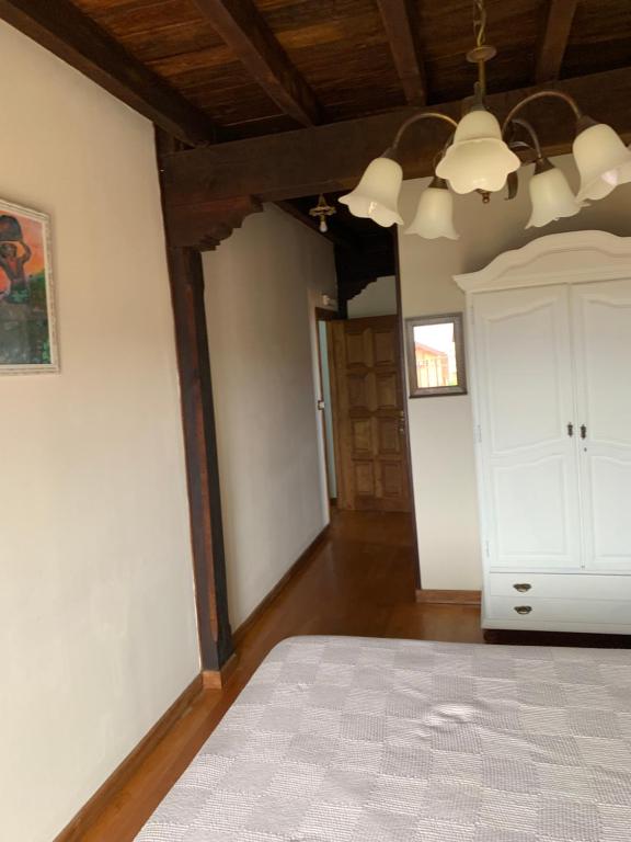 A bed or beds in a room at Posada El Jardin de Angela