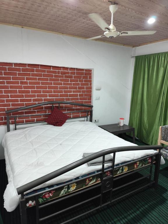 Postel nebo postele na pokoji v ubytování Shamus Javed Homestay