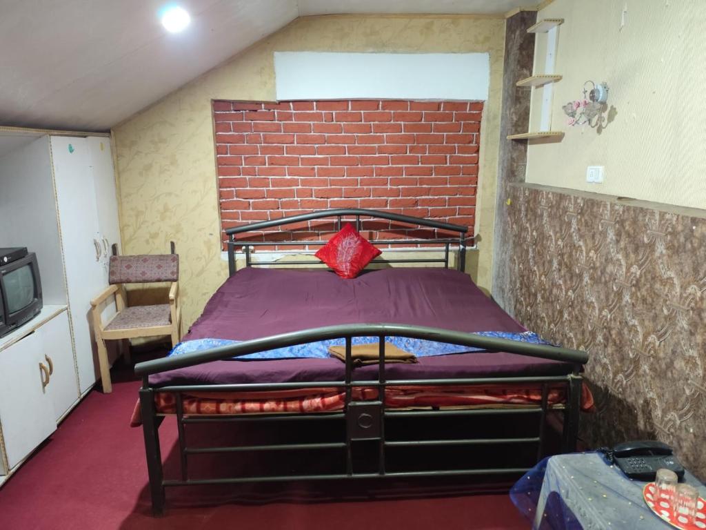 Postel nebo postele na pokoji v ubytování Shamus Javed Homestay