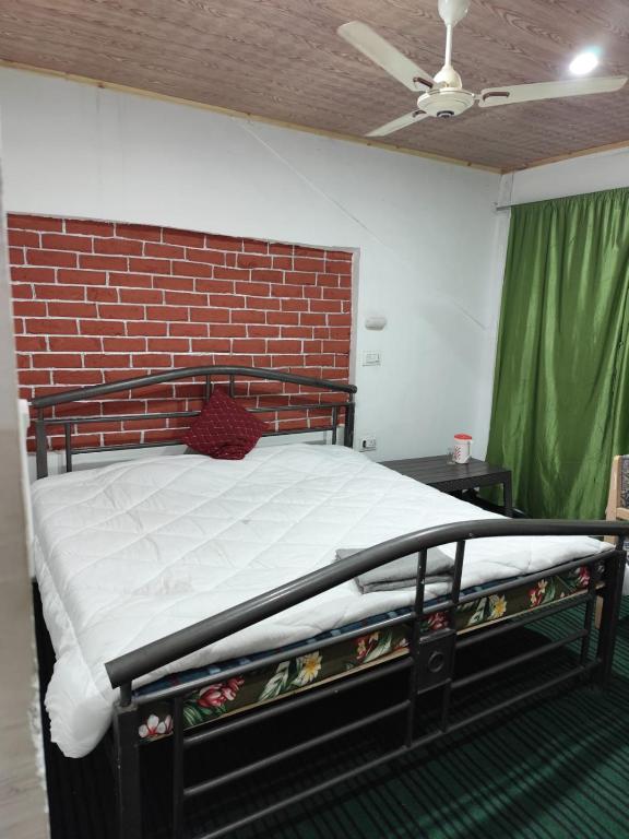 Postel nebo postele na pokoji v ubytování Shamus Javed Homestay