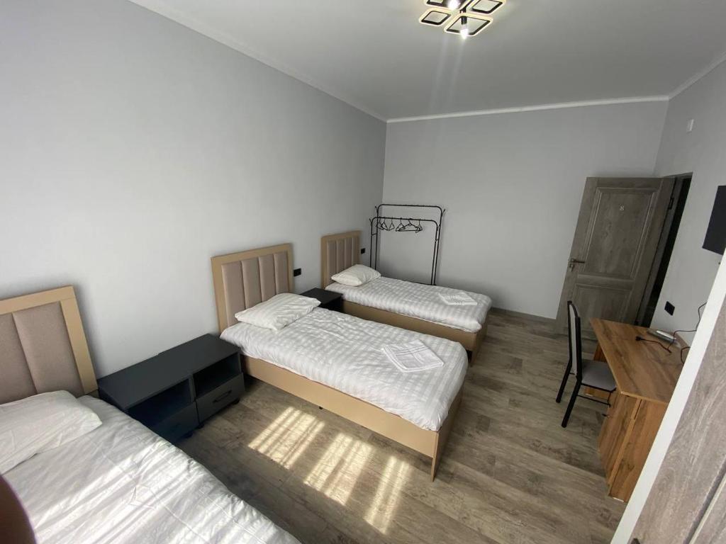 Postel nebo postele na pokoji v ubytování Bagysh Hotel