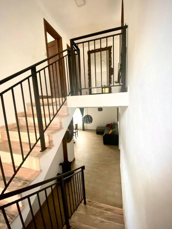 Postel nebo postele na pokoji v ubytování Casa Alex