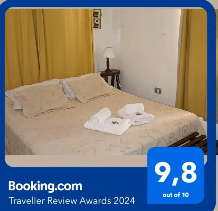 En eller flere senge i et værelse på La Pirca Rosada