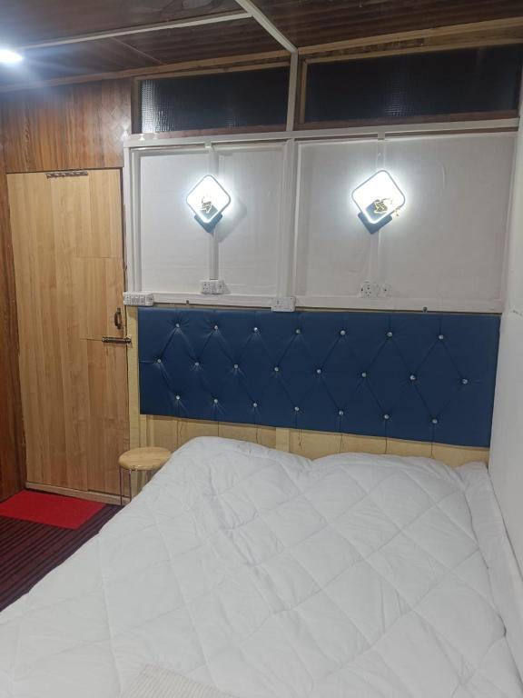 Postel nebo postele na pokoji v ubytování Shamus Javed Homestay