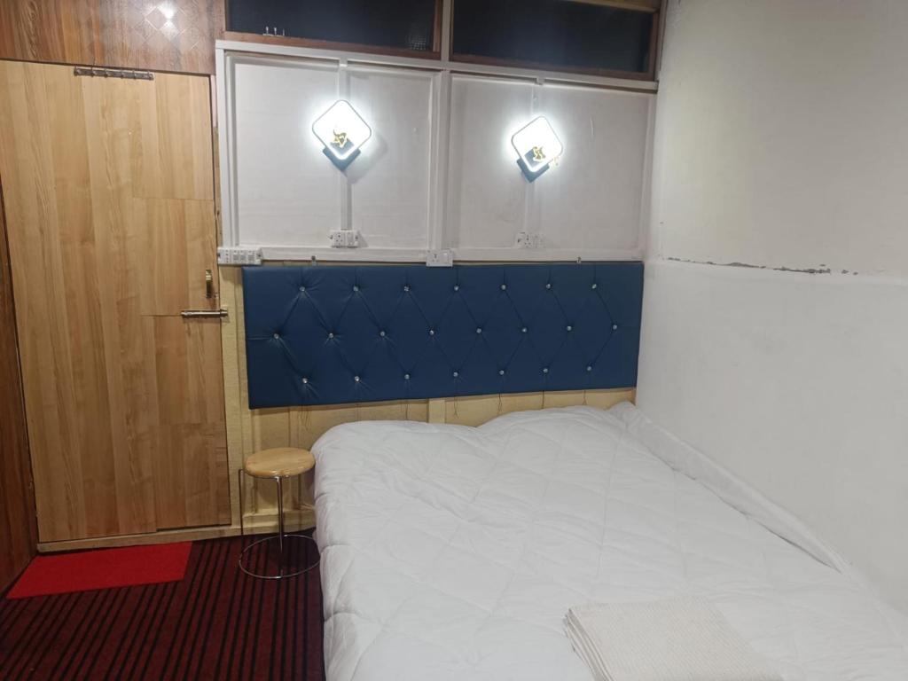 Postel nebo postele na pokoji v ubytování Shamus Javed Homestay