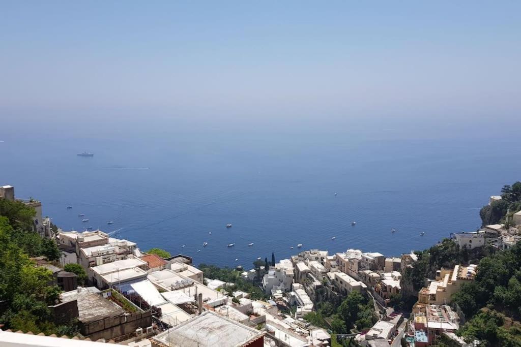 an aerial view of a city and the ocean at Casa Stella di mare in Positano