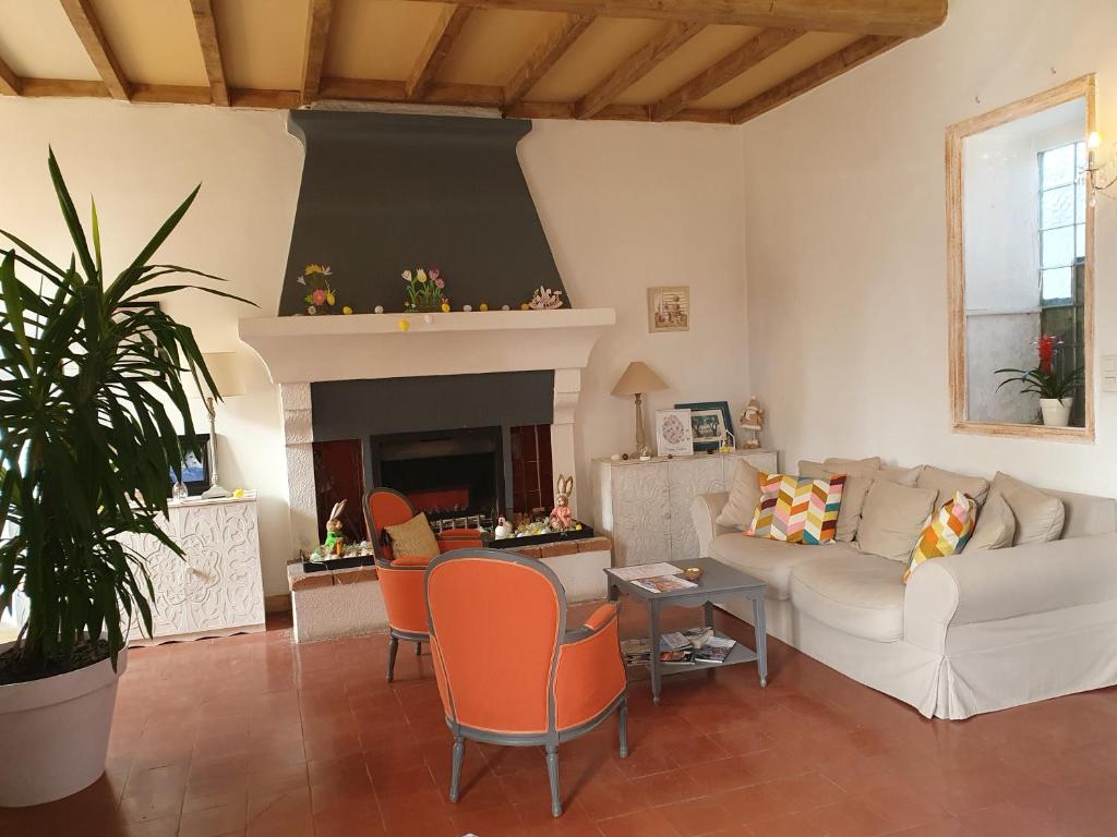 Posezení v ubytování Le Mas des Quintrands Manosque - Motel de charme