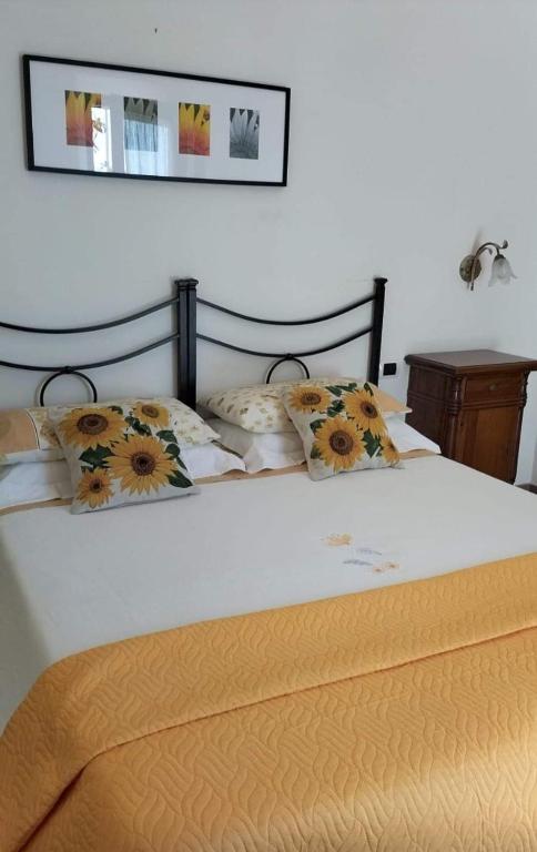 Postel nebo postele na pokoji v ubytování Affittacamere ALBA FIORITA