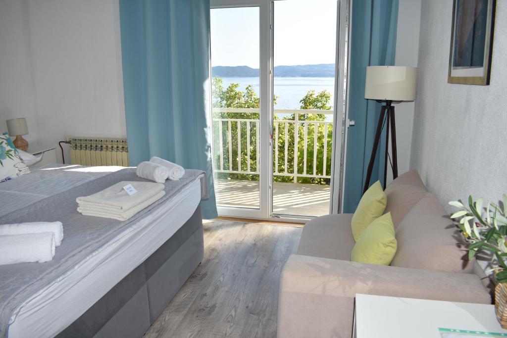 Posteľ alebo postele v izbe v ubytovaní Villa Vineyard oaza