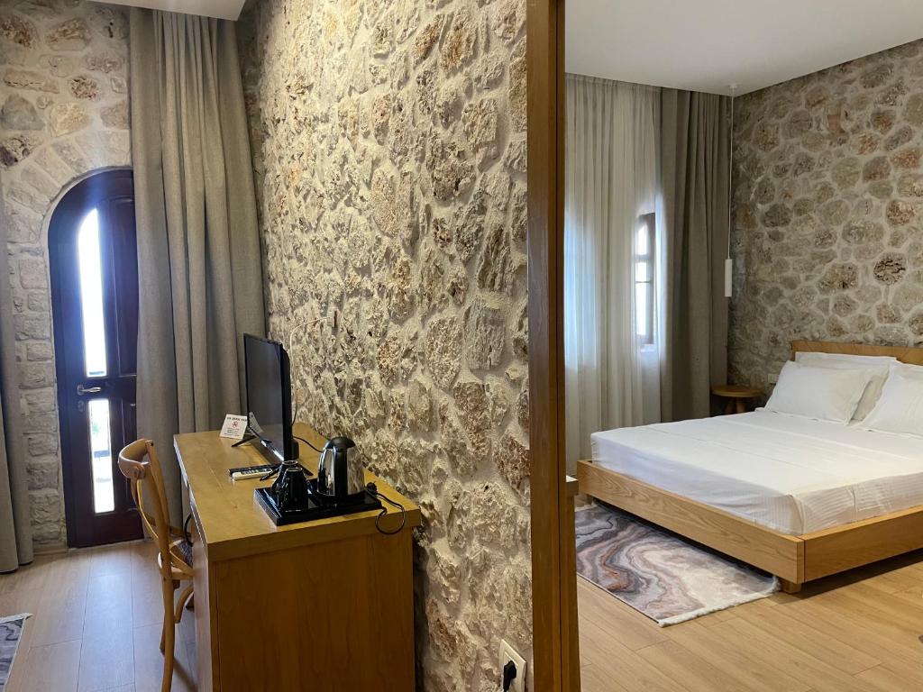 Postel nebo postele na pokoji v ubytování Valta Hotel
