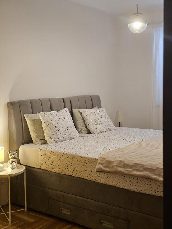 Postel nebo postele na pokoji v ubytování Apartment Antonia