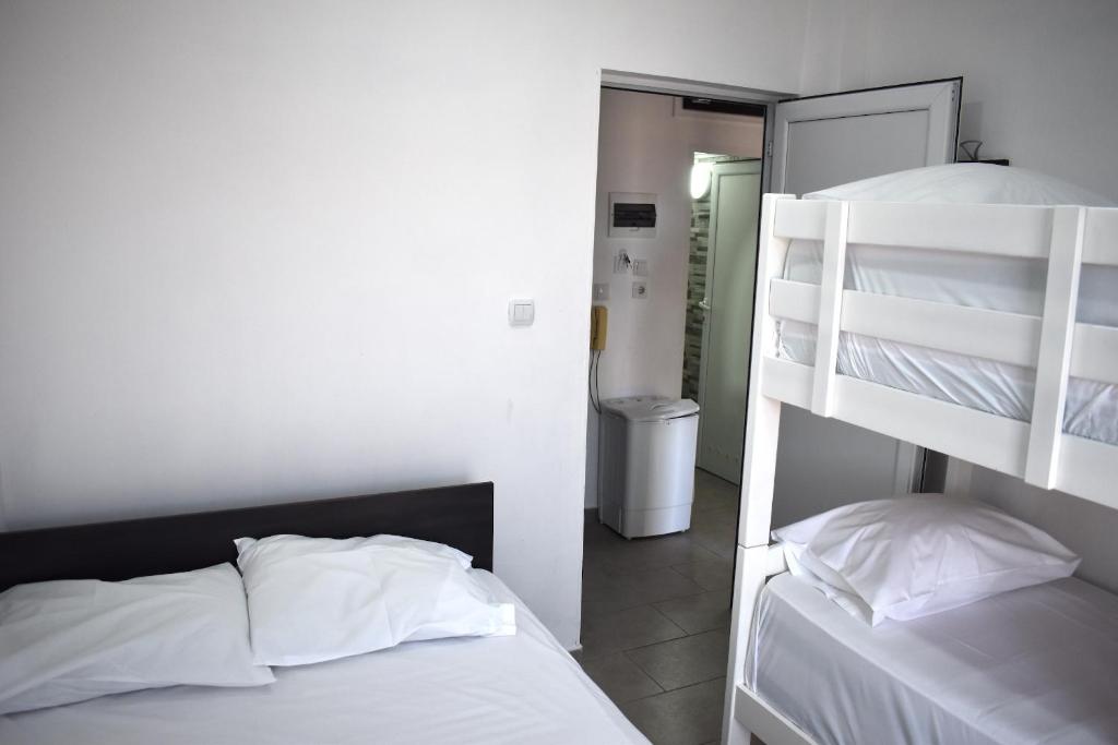 Postel nebo postele na pokoji v ubytování New Apartment Nea Kalikratia Chalkidiki near beach
