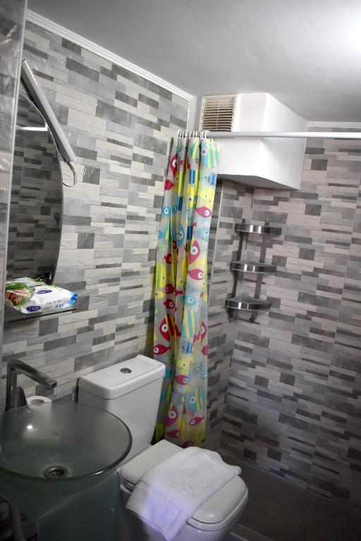 Koupelna v ubytování New Apartment Nea Kalikratia Chalkidiki near beach