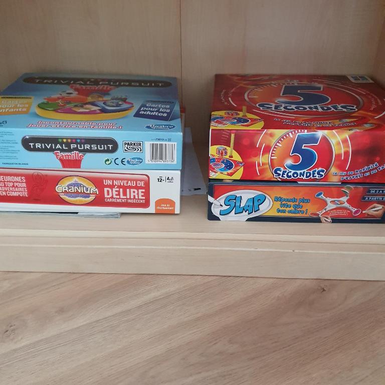 a shelf with three boxes of snacks on it at Superbe vue sur mer à Sète in Sète