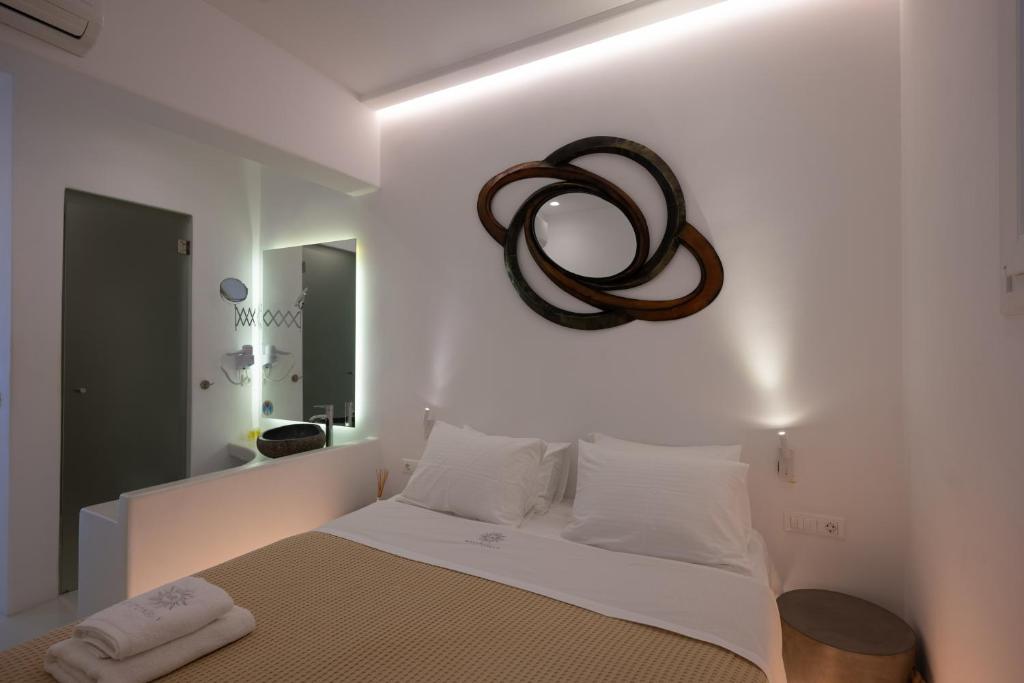 Postel nebo postele na pokoji v ubytování Hyades - Downtown Suites, Mykonos Town