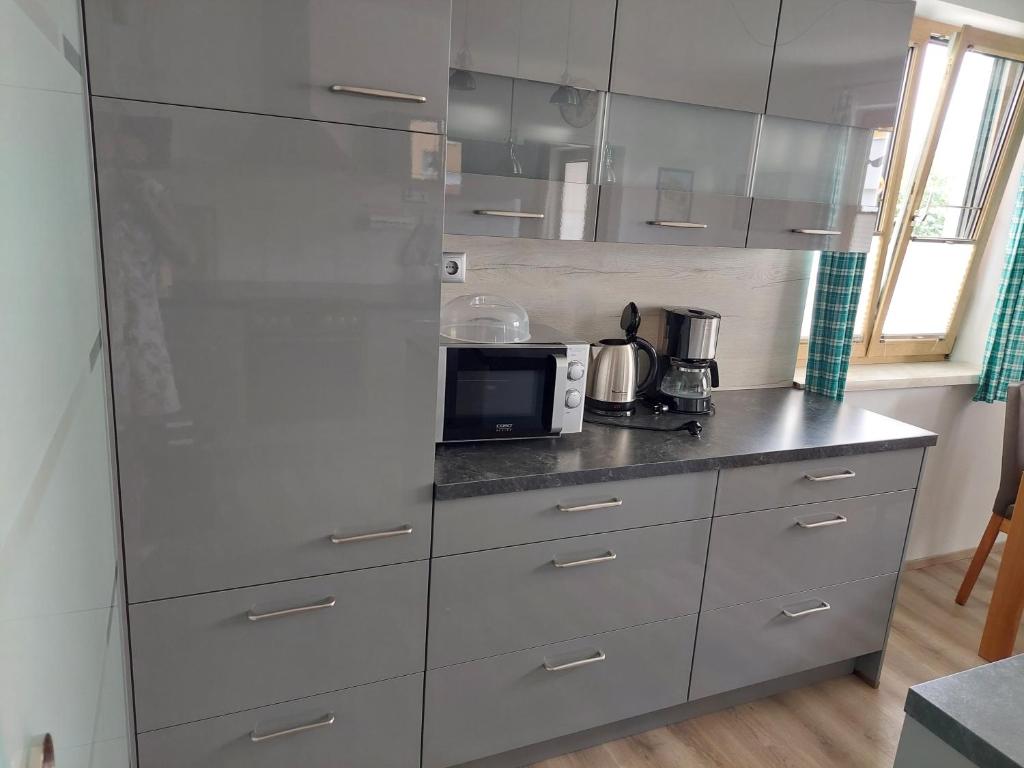 Een keuken of kitchenette bij Wohnung mit Charme in Pinsdorf