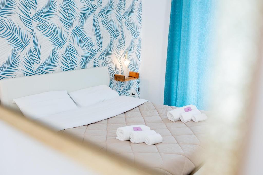 Postel nebo postele na pokoji v ubytování Zangara Flat