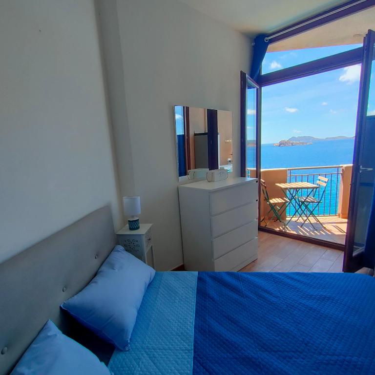 Postel nebo postele na pokoji v ubytování L'incanto Blu