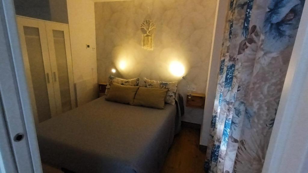 Posteľ alebo postele v izbe v ubytovaní mi apartamento 60
