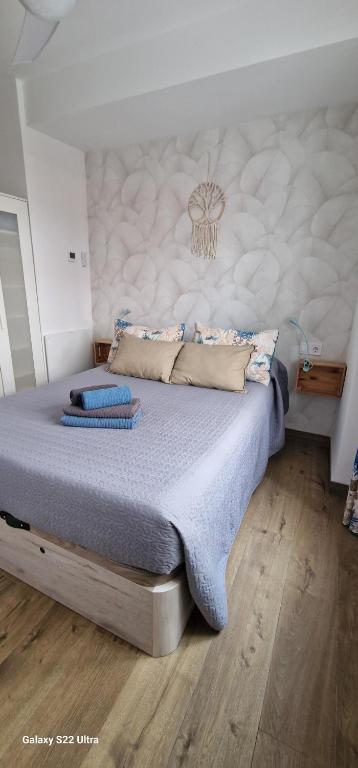 Posteľ alebo postele v izbe v ubytovaní mi apartamento 60