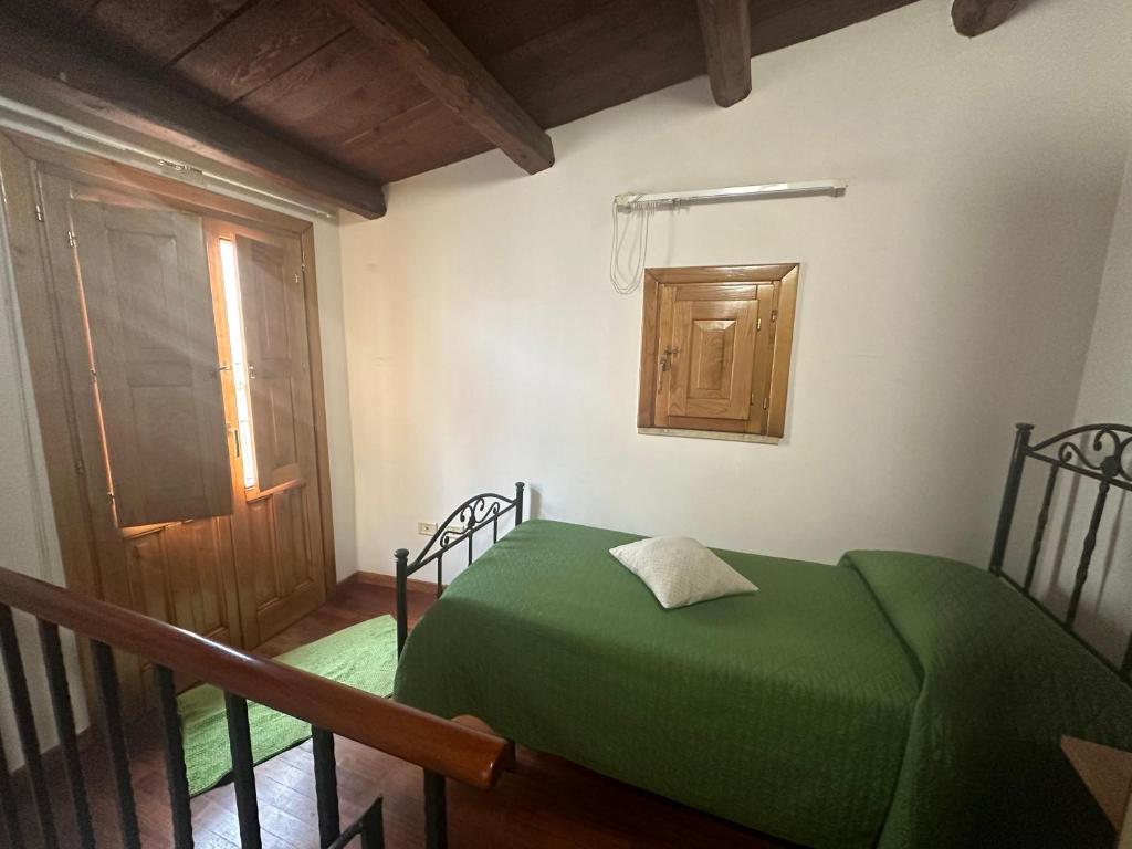 Postel nebo postele na pokoji v ubytování Affittacamere Resalibera
