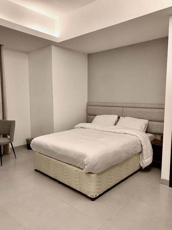 Postel nebo postele na pokoji v ubytování Iveria Hotel Apartments