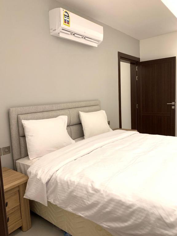Postel nebo postele na pokoji v ubytování Iveria Hotel Apartments