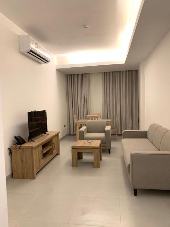 TV a/nebo společenská místnost v ubytování Iveria Hotel Apartments