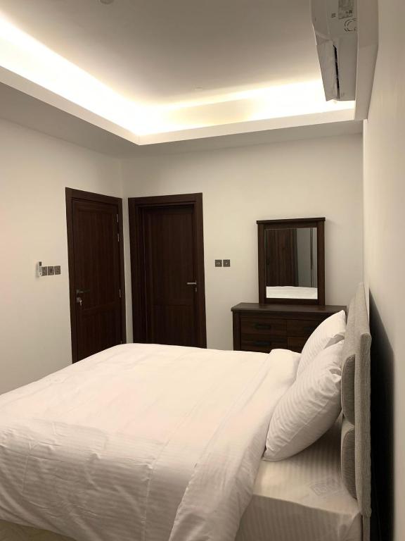 Postel nebo postele na pokoji v ubytování Iveria Hotel Apartments
