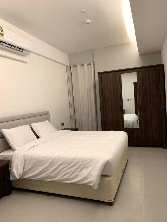 Postel nebo postele na pokoji v ubytování Iveria Hotel Apartments