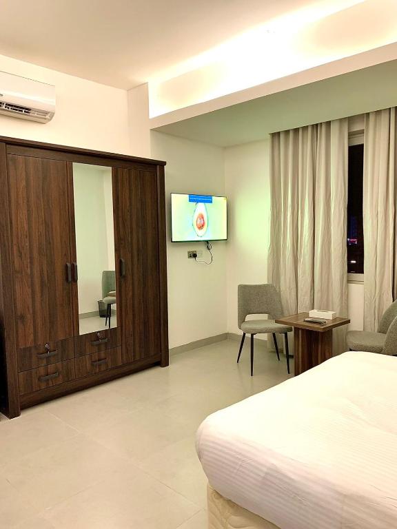 TV a/nebo společenská místnost v ubytování Iveria Hotel Apartments
