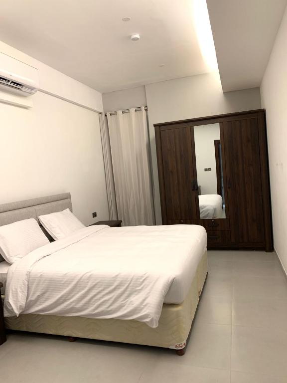 Postel nebo postele na pokoji v ubytování Iveria Hotel Apartments