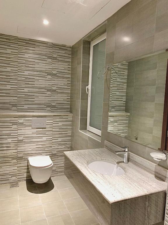 Koupelna v ubytování Iveria Hotel Apartments