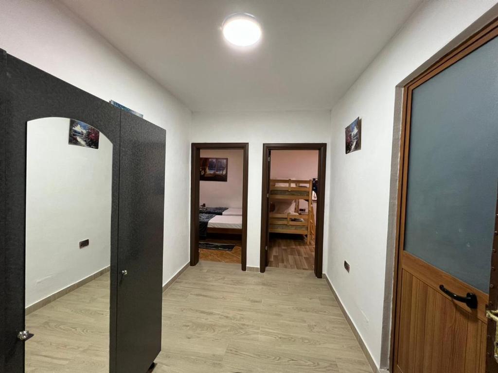 Postel nebo postele na pokoji v ubytování Necaj Apartment
