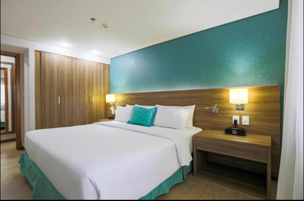 Postel nebo postele na pokoji v ubytování Apto Flat - Radisson Belém