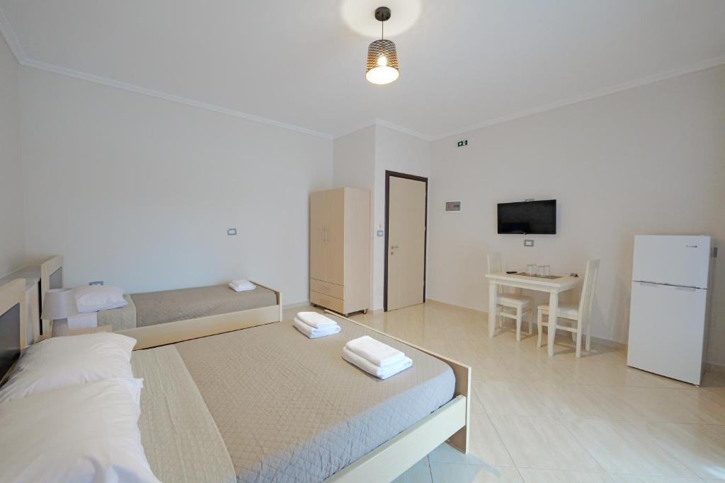 Postel nebo postele na pokoji v ubytování Hotel Deja Vu