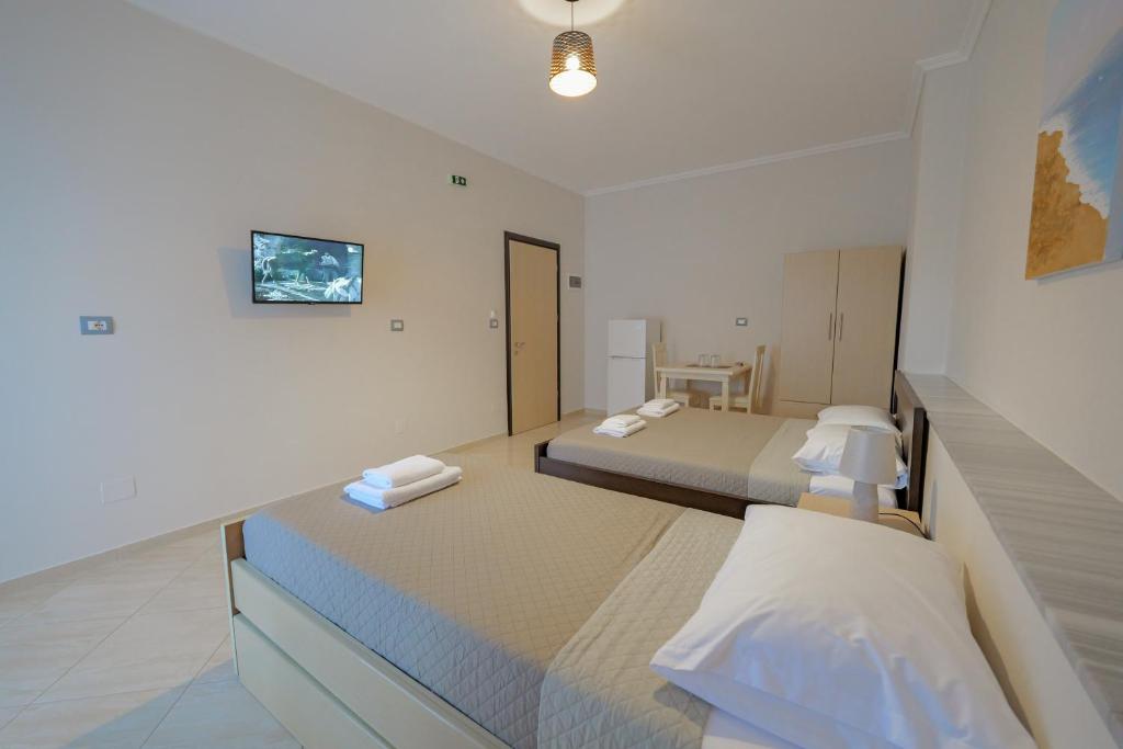 Postel nebo postele na pokoji v ubytování Hotel Deja Vu