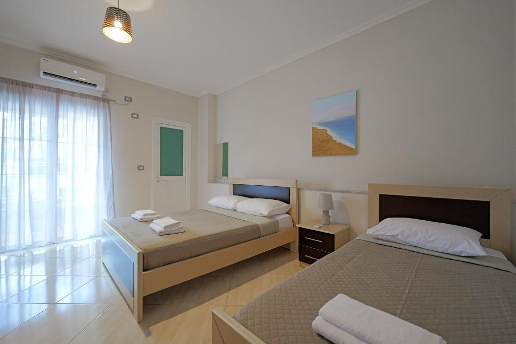 Postel nebo postele na pokoji v ubytování Hotel Deja Vu