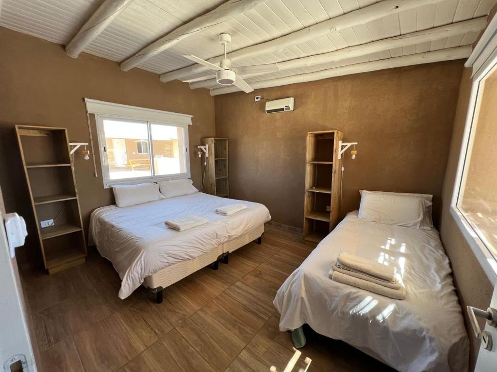 A bed or beds in a room at El Campito Cabaña para 5 personas
