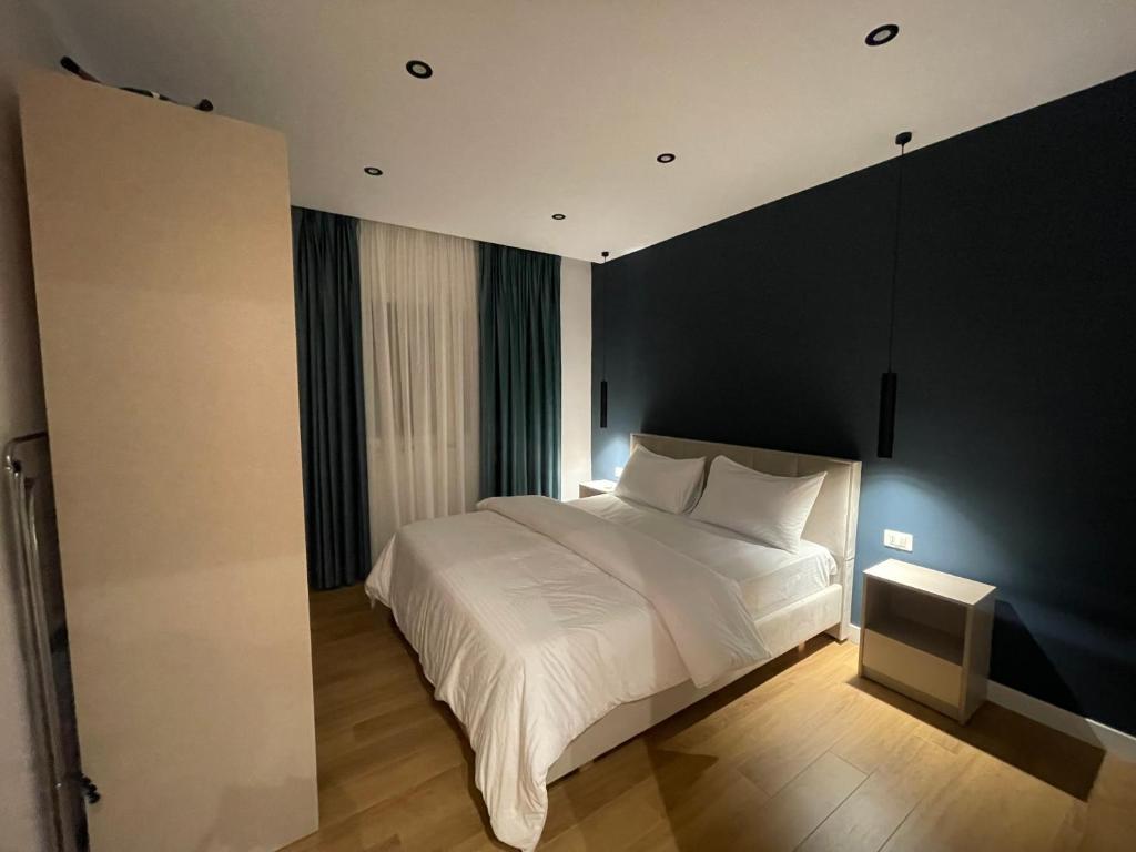 Postel nebo postele na pokoji v ubytování Central Modern Apartment