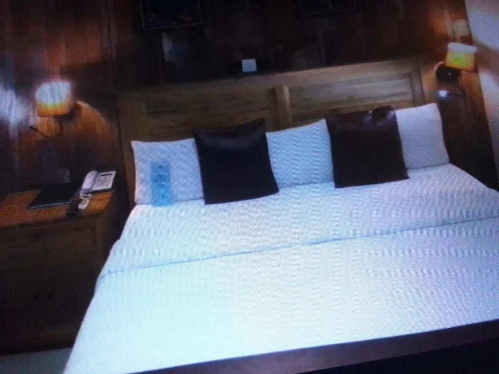 Ένα ή περισσότερα κρεβάτια σε δωμάτιο στο Villa toscana Victoria island oniru