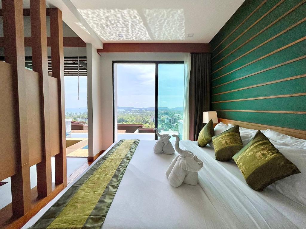 Postel nebo postele na pokoji v ubytování 208 Ao Nang, Private Sea View Pool Villa