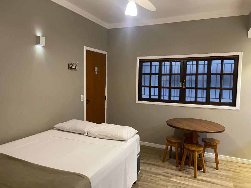 Postel nebo postele na pokoji v ubytování Pousada Chilli Brasil