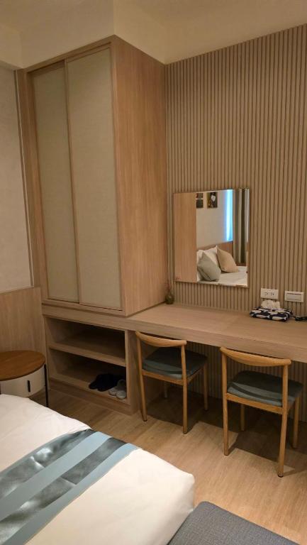 Postel nebo postele na pokoji v ubytování Senya Hotel