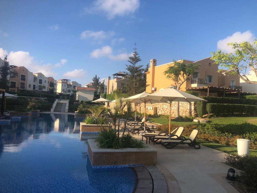 The swimming pool at or close to Fancy sea view villa with private jacuzzi mountain view north coast Bait Karim - Twin Villa with roof & juccuzi