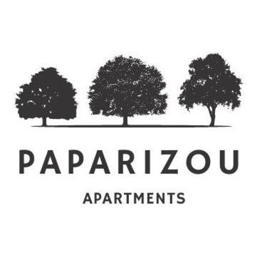 a group of three trees with the words paparazzo departments at Paparizou Apartments in Kokkino Nero