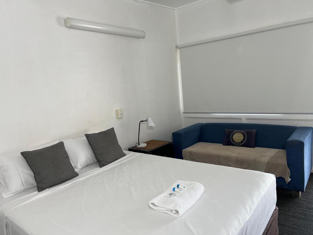 Postel nebo postele na pokoji v ubytování Shell Motel (Pearly Shell Motel)